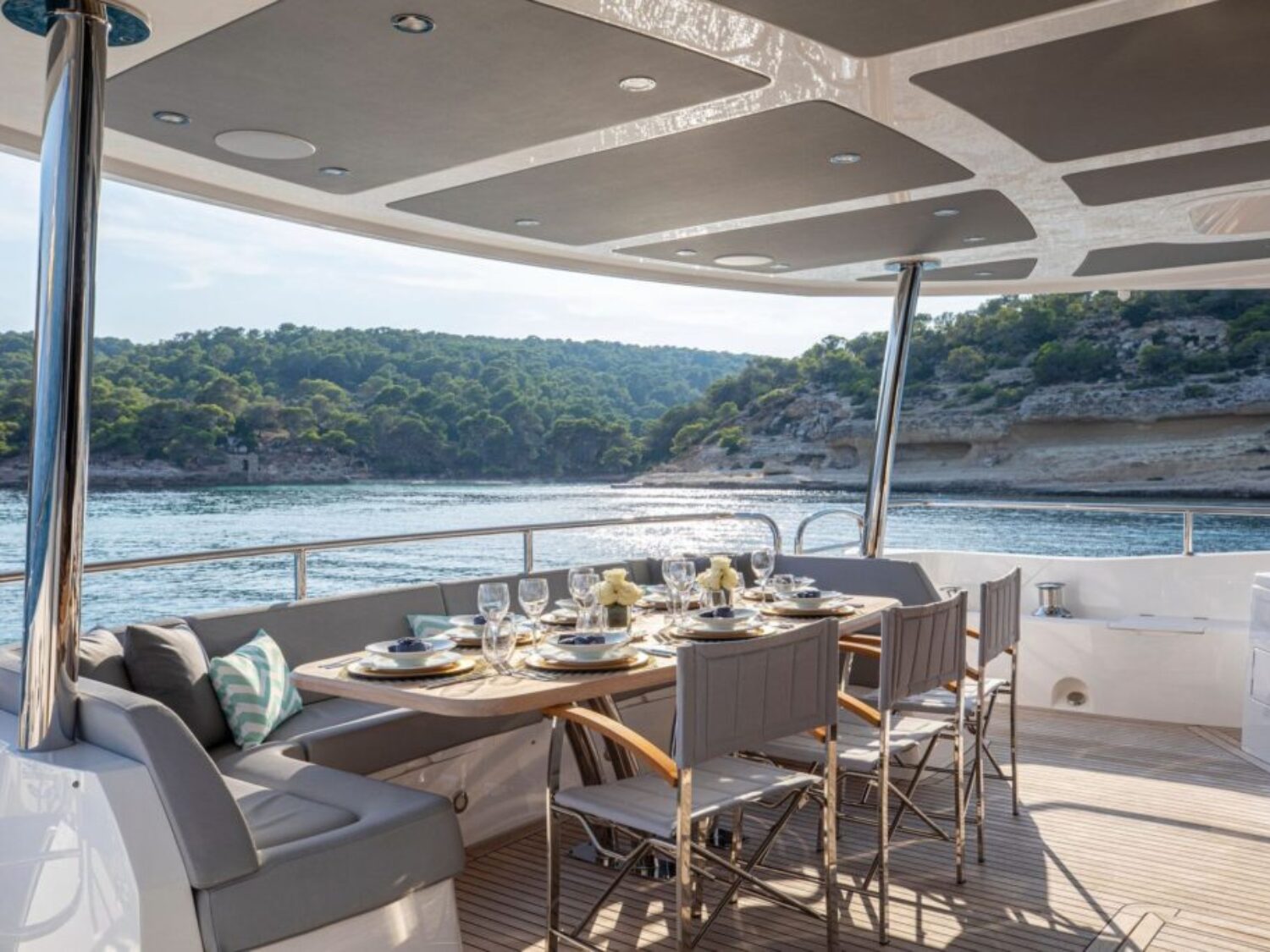 Motor-Yacht-Rush-X-for-charter-in-Mallorca-aft-deck-dining-area-side-view-1024x683