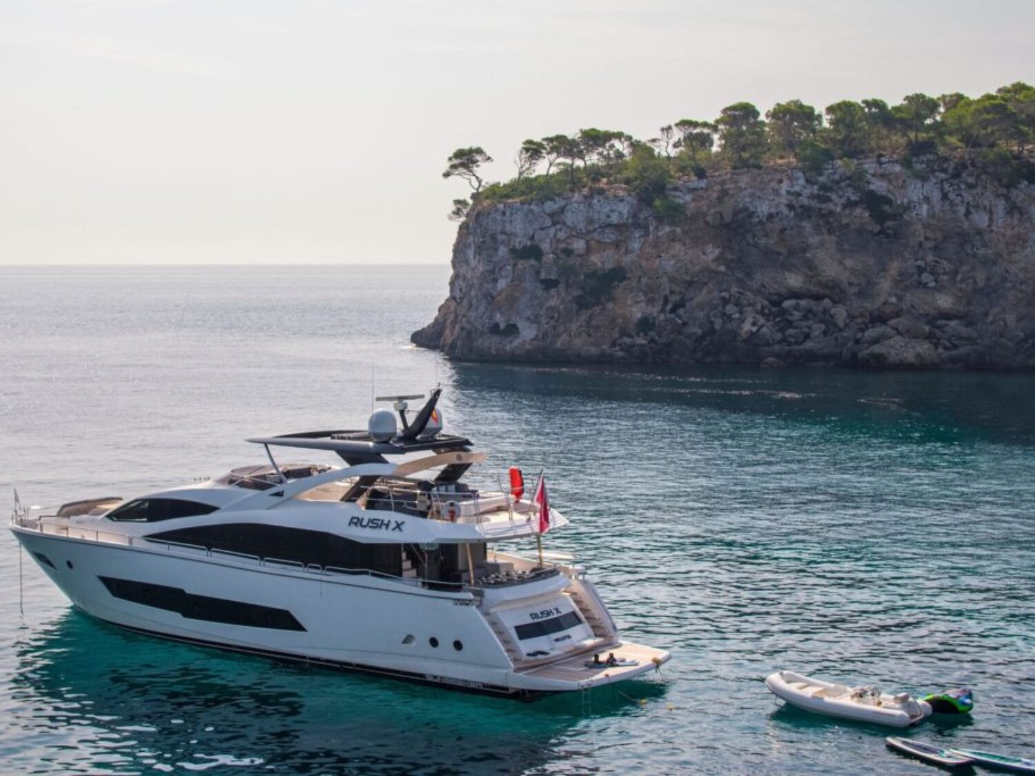 Motor-Yacht-Rush-X-for-charter-in-Mallorca-on-anchor-with-toys-1024x683