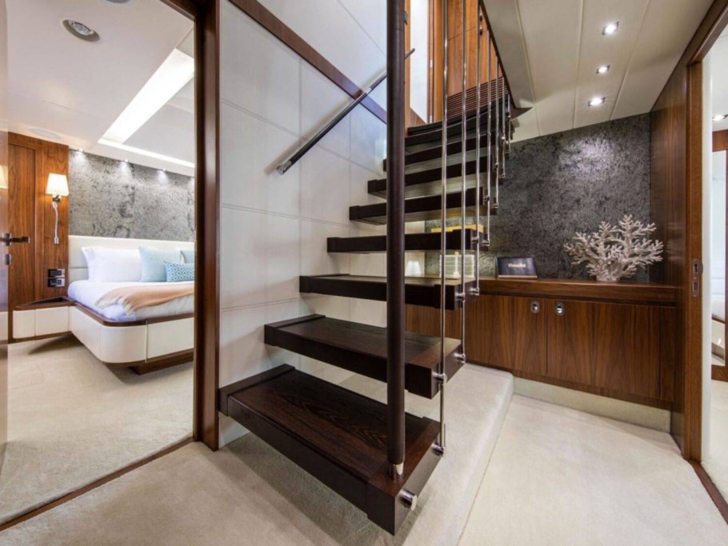 Motor-Yacht-Rush-X-for-charter-in-Mallorca-staircase-to-guest-cabins-1024x683